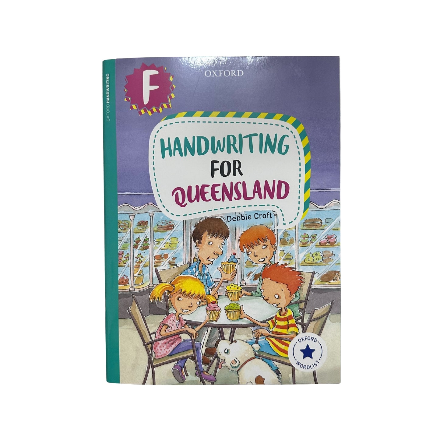 Book titled 'Handwriting for Queensland' with illustrations of children at a table on the cover.