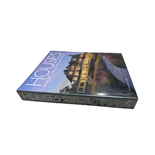 Book titled 'Houses' by Robert A.M. Stern Architects on a white background