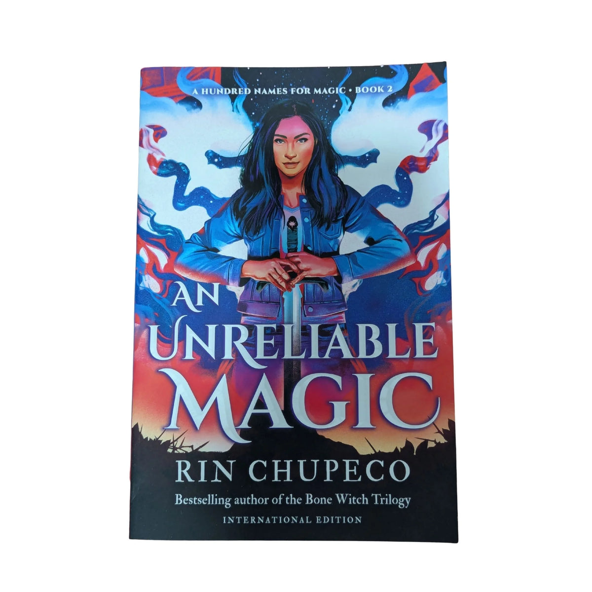 Cover of An Unreliable Magic by Rin Chupeco