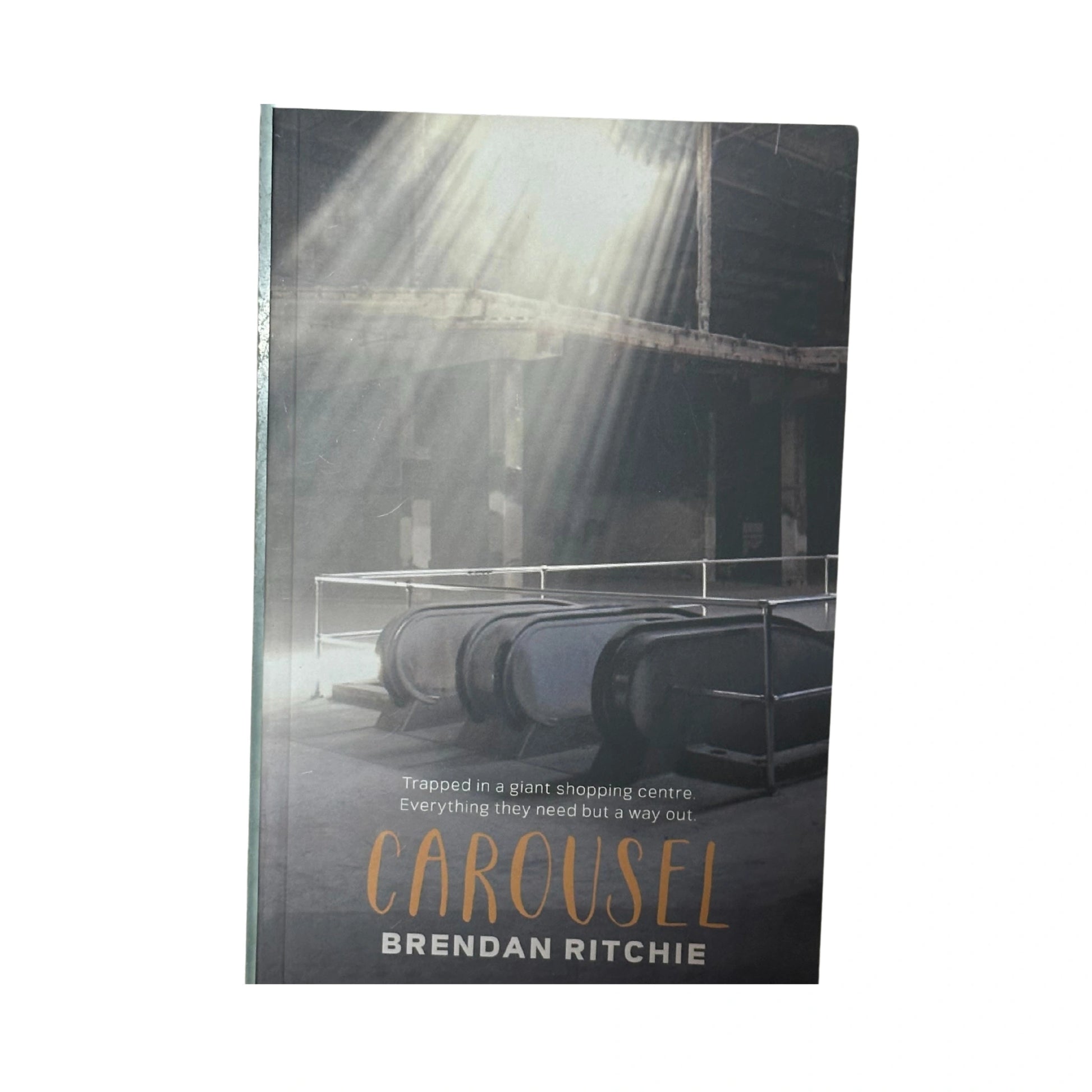 Official front cover of Carousel by Brendan Ritchie, a genuine imported speculative fiction novel published by Fremantle Press.