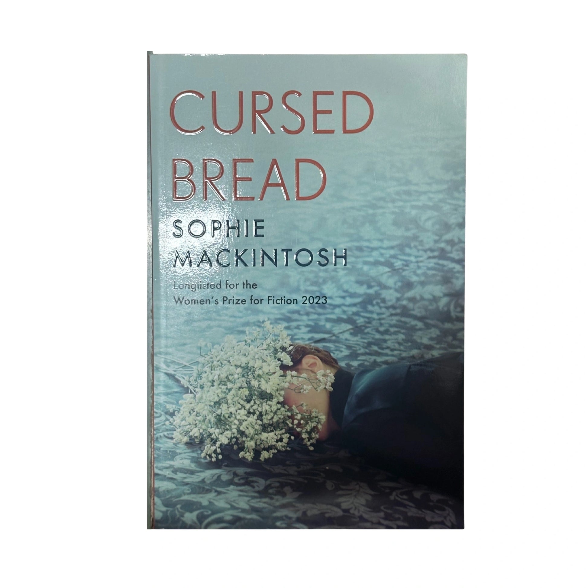 The front cover of Cursed Bread by Sophie Mackintosh, available as an original imported copy at Generation Books Collection Pakistan.