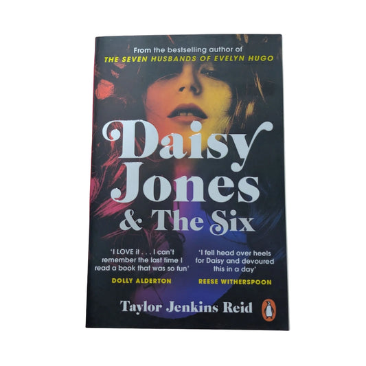 Front cover of Daisy Jones & The Six by Taylor Jenkins Reid, a 1970s rock-and-roll novel about a fictional band's rise to fame, romance and secrets