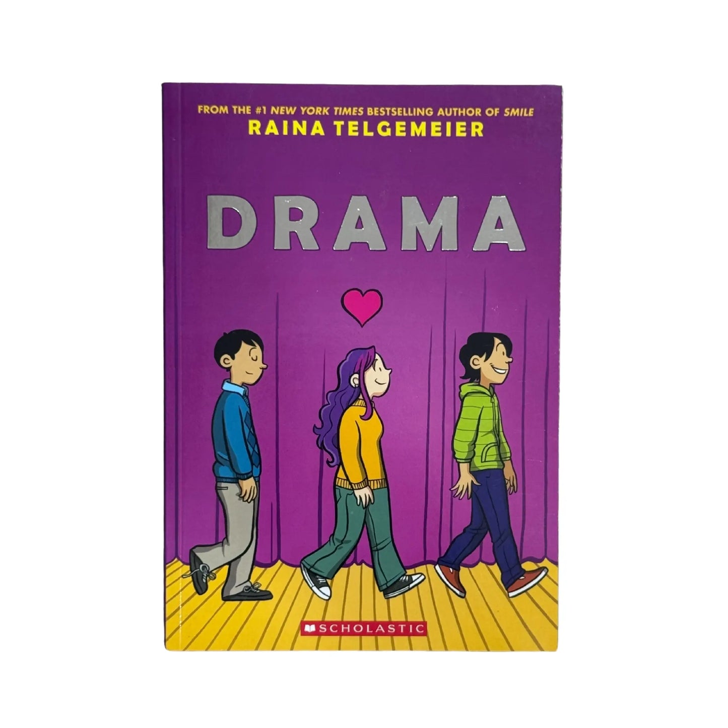 The front cover of Drama: A Graphic Novel by Raina Telgemeier, available as an original imported copy at Generation Books Collection Pakistan.