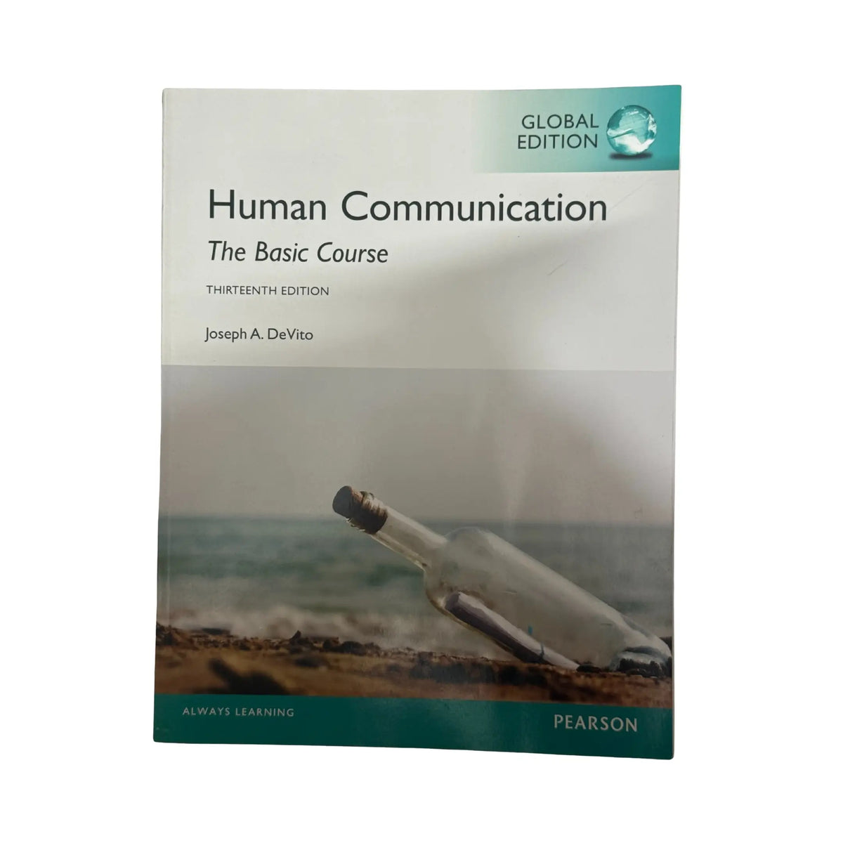 The front cover of Human Communication: The Basic Course by Joseph A. DeVito, available as an original imported copy at Generation Books Collection Pakistan.