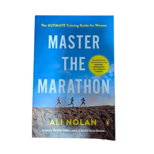 Front cover of Master the Marathon by Ali Nolan, a women's marathon training guide with a foreword by Desiree Linden