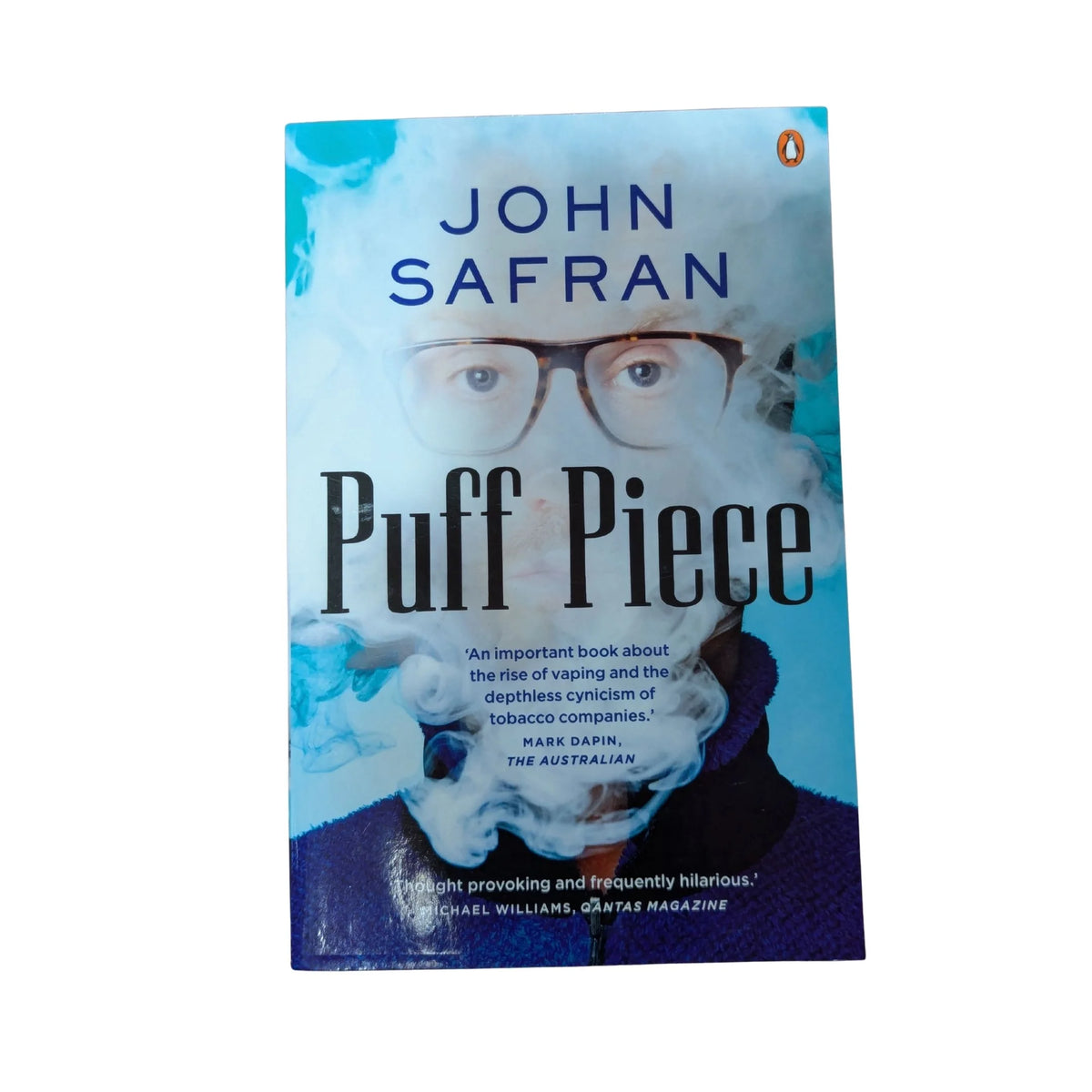 Front cover of Puff Piece by John Safran, an investigative nonfiction book examining the tobacco industry, vaping, corporate marketing and the power of language