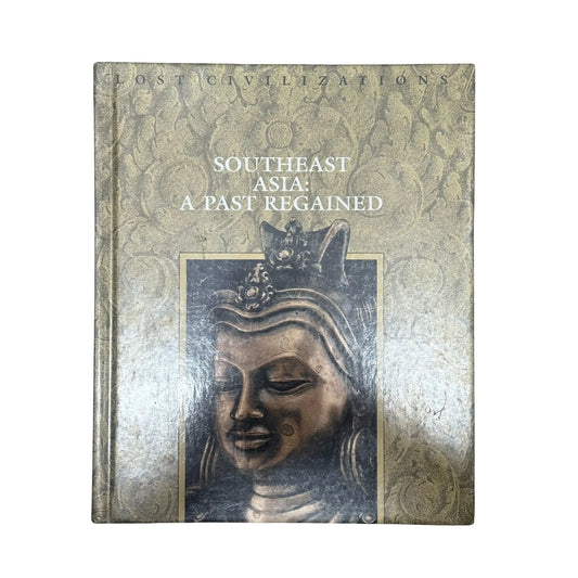Book titled 'Southeast Asia: A Past Regained' with a decorative cover featuring an image of a statue.