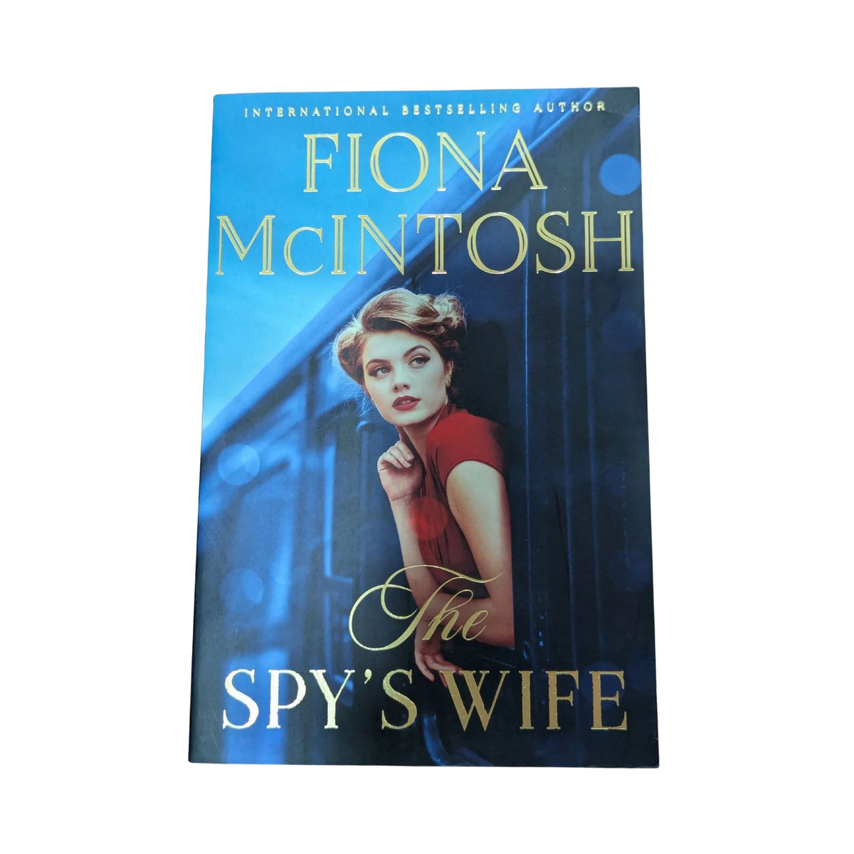 Front cover of The Spy’s Wife by Fiona McIntosh, a historical espionage thriller set before World War II